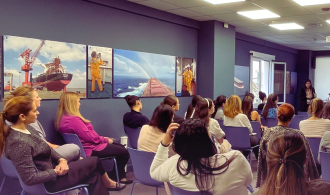 The team attending the talk.